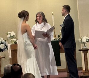 Michelle Hintz presides at a summer wedding
