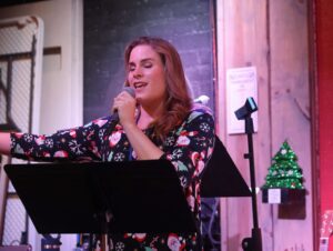 Kaylee Vance, M.Div. student at Luther Seminary, leads worship at the Heart, a Christian ministry in Central Florida that meets in bars and breweries.